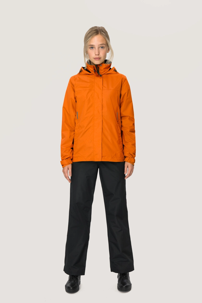 HAKRO Damen Regenjacke Colorado zum Besticken und Bedrucken in der Farbe Orange mit Ihren Logo, Schriftzug oder Motiv.