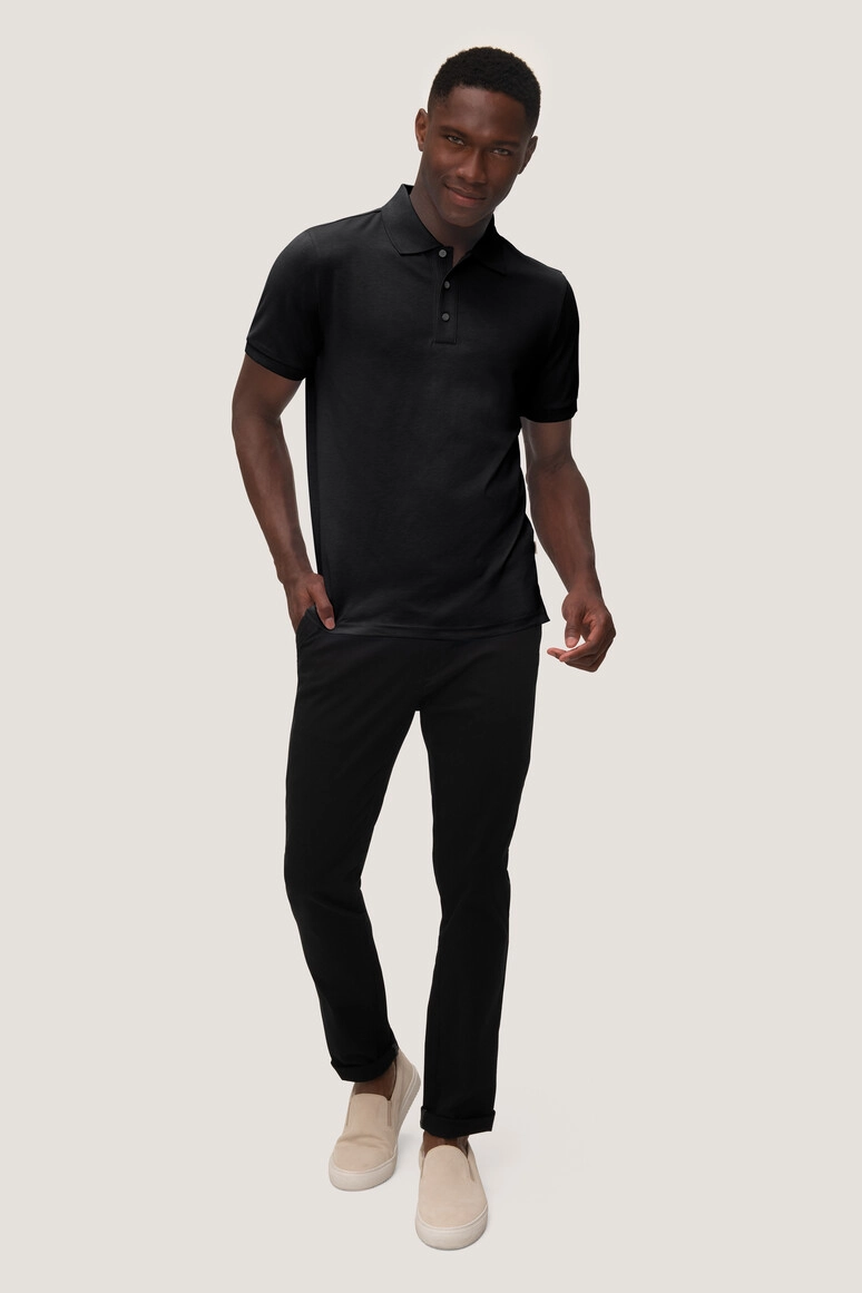 HAKRO Cotton Tec® Poloshirt zum Besticken und Bedrucken in der Farbe Schwarz mit Ihren Logo, Schriftzug oder Motiv.