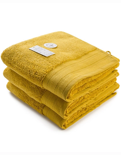 Hand Towel Excellent Deluxe zum Besticken und Bedrucken in der Farbe Mustard mit Ihren Logo, Schriftzug oder Motiv.